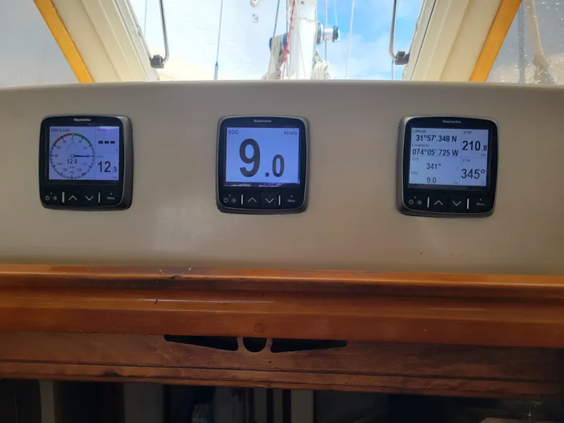 Slide: The Image of Navigation instruments on a 1996 Little Harbor 51 Pilothouse yacht dashboard. - 25