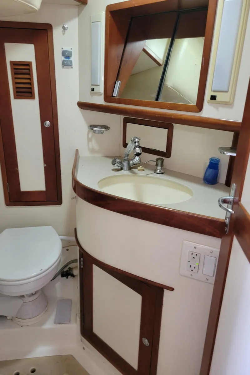 Slide: The Image of Bathroom interior of 1996 Little Harbor 51 Pilothouse yacht, featuring sink and toilet. - 36