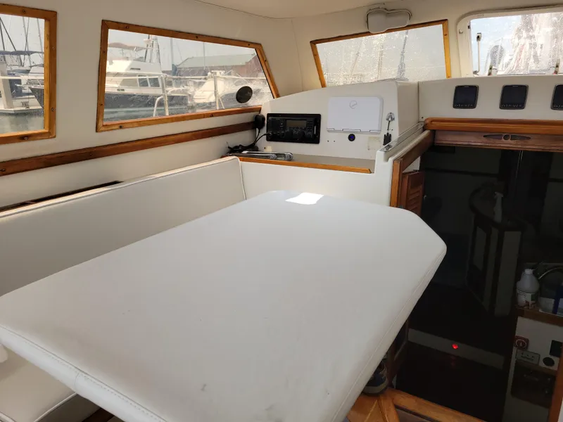 Slide: The Image of Interior of 1996 Little Harbor 51 Pilothouse with seating and navigation equipment. - 22
