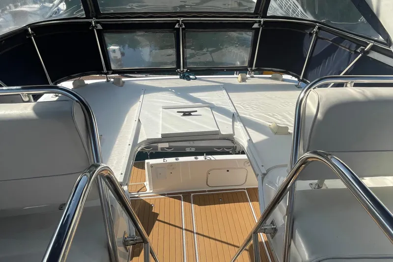 Slide: The Image of 2001 Bayliner 3388 Command Bridge Motoryacht interior with seating and helm view. - 26