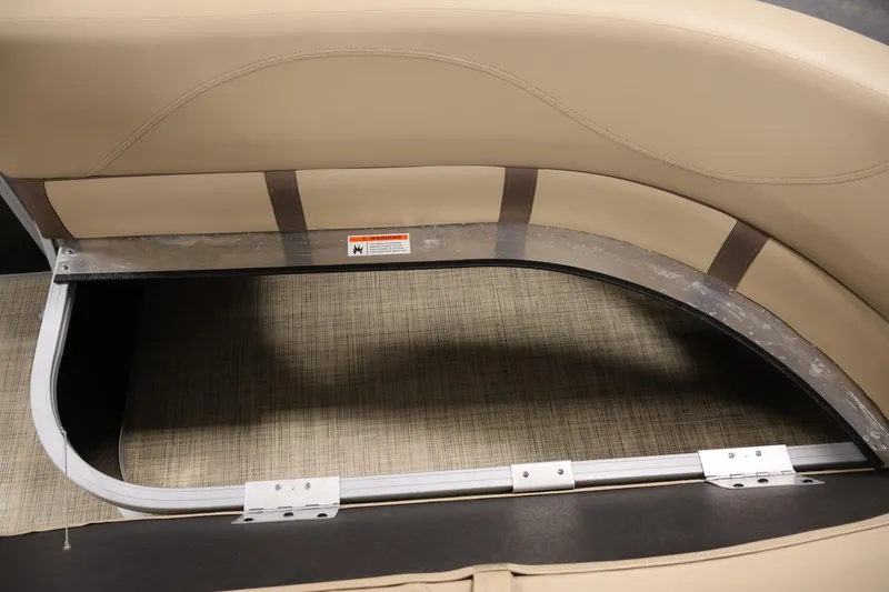 Slide: The Image of 2022 Harris Cruiser LX180 Cruise boat seat storage compartment with beige upholstery. - 13