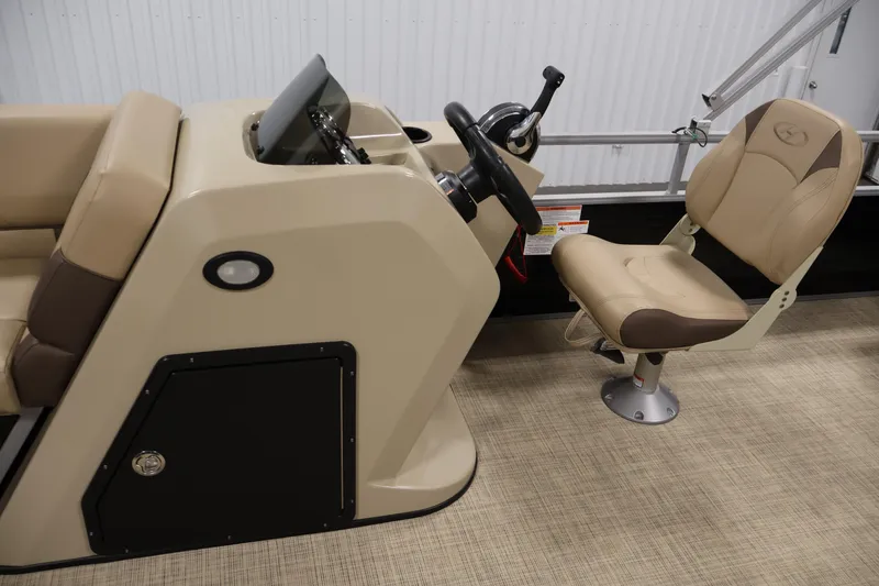 Slide: The Image of 2022 Harris Cruiser LX180 Cruise boat interior with steering console and captain's chair. - 15
