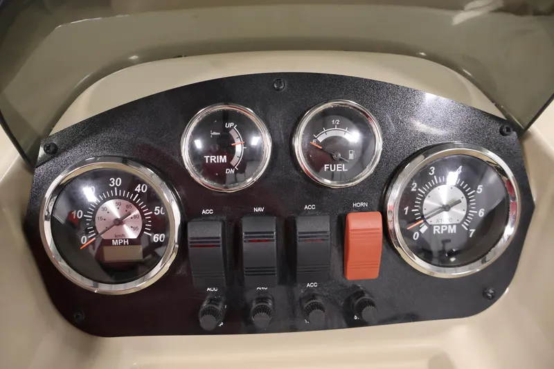 Slide: The Image of Dashboard of 2022 Harris Cruiser LX180 Cruise with gauges and switches. - 19