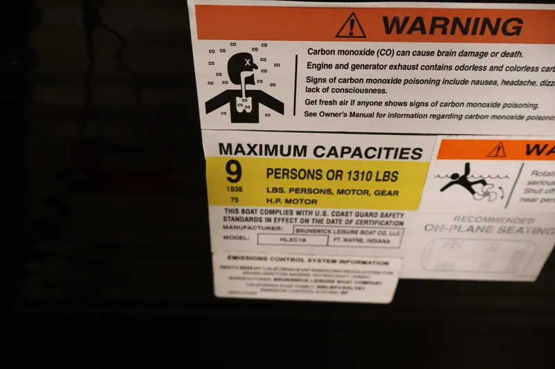 Slide: The Image of Warning label on 2022 Harris Cruiser LX180 Cruise, detailing carbon monoxide risks and capacity limits. - 20