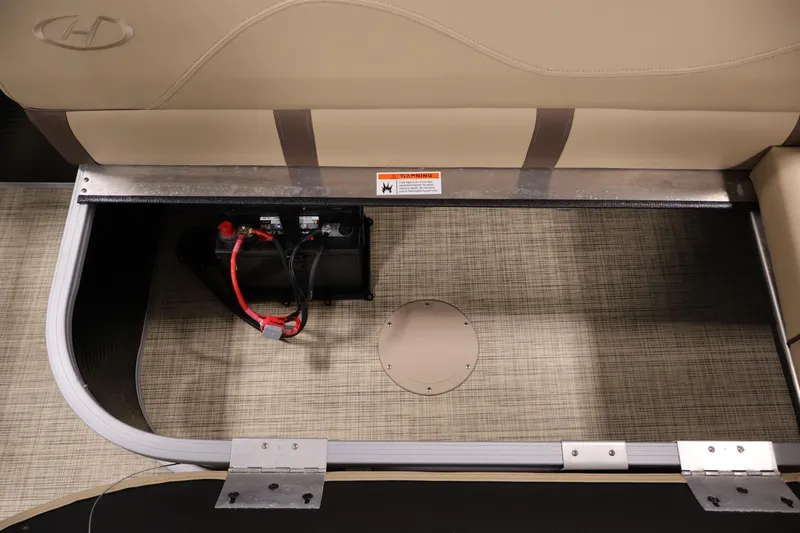 Slide: The Image of Battery compartment of 2022 Harris Cruiser LX180 Cruise pontoon boat, featuring secure wiring. - 24