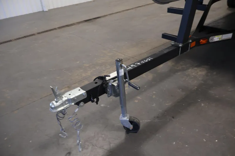 Slide: The Image of Trailer hitch of 2022 Harris Cruiser LX180 Cruise boat on concrete floor. - 30