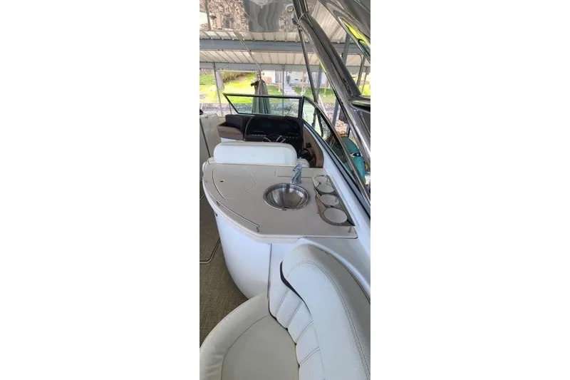 Slide: The Image of 2017 Cobalt R35 boat interior with white seating and sleek design. - 15