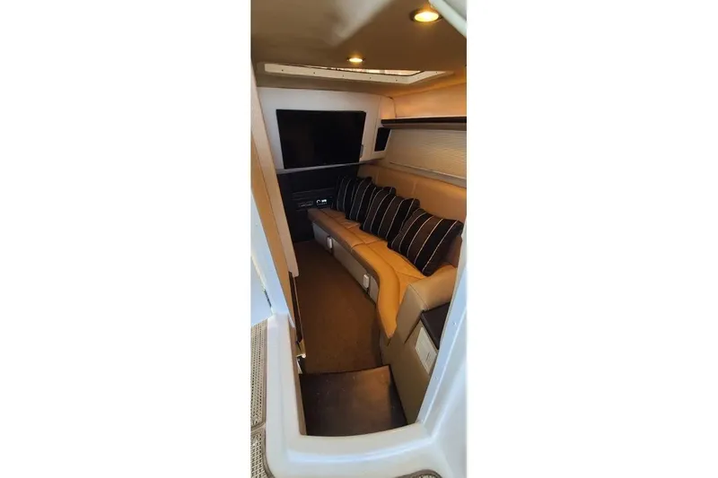 Slide: The Image of Luxury seating on a 2017 Cobalt R35 boat, featuring white leather upholstery. - 16