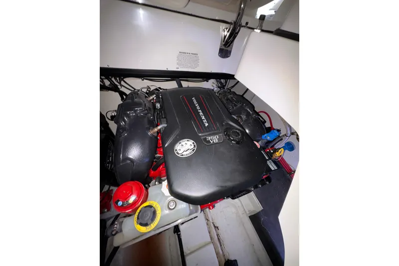 Slide: The Image of Engine compartment of a 2017 Cobalt R35 boat featuring a Volvo Penta 350 V8 engine. - 30