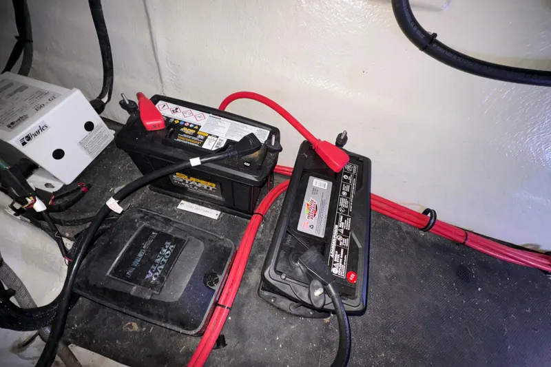 Slide: The Image of 2017 Cobalt R35 battery compartment with connected cables and power components. - 35