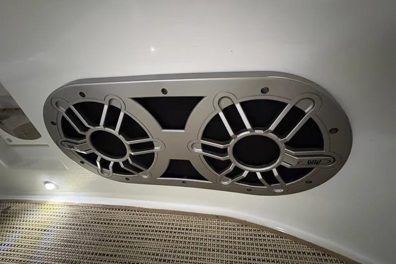 Slide: The Image of Dual marine speakers installed on a 2017 Cobalt R35 boat ceiling. - 38