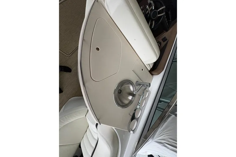 Slide: The Image of 2017 Cobalt R35 boat interior with sink and control panel. - 41