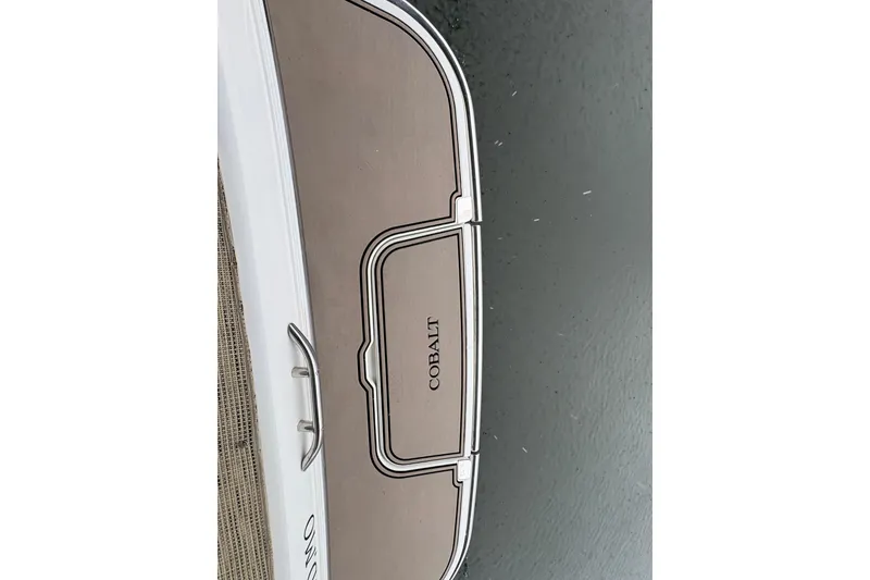 Slide: The Image of 2017 Cobalt R35 boat deck with logo on water. - 43