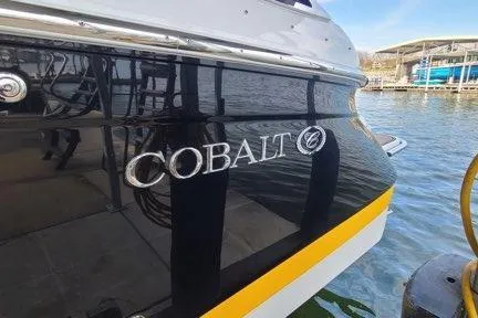 Slide: The Image of 2017 Cobalt R35 interior controls with leather accents and modern dashboard features. - 8