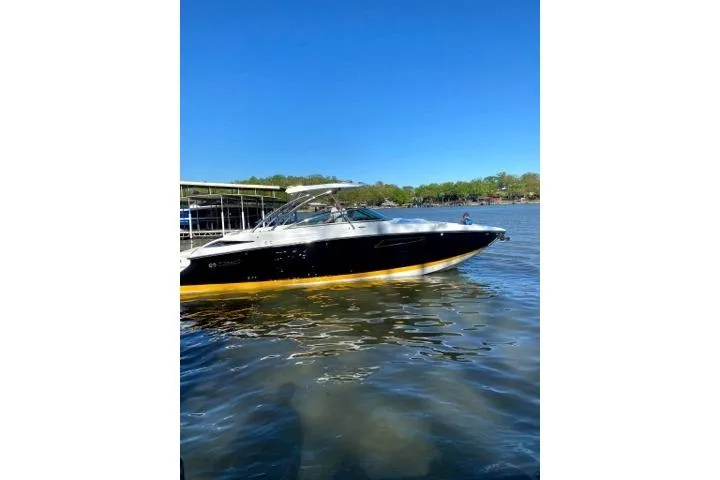 Slide: The Image of Lenco control panel on 2017 Cobalt R35 boat's brown leather interior. - 9