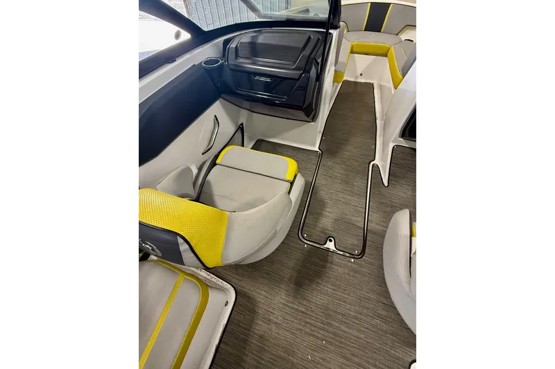 Slide: The Image of 2023 Scarab 195 ID boat in a garage, showcasing sleek design and modern features. - 6