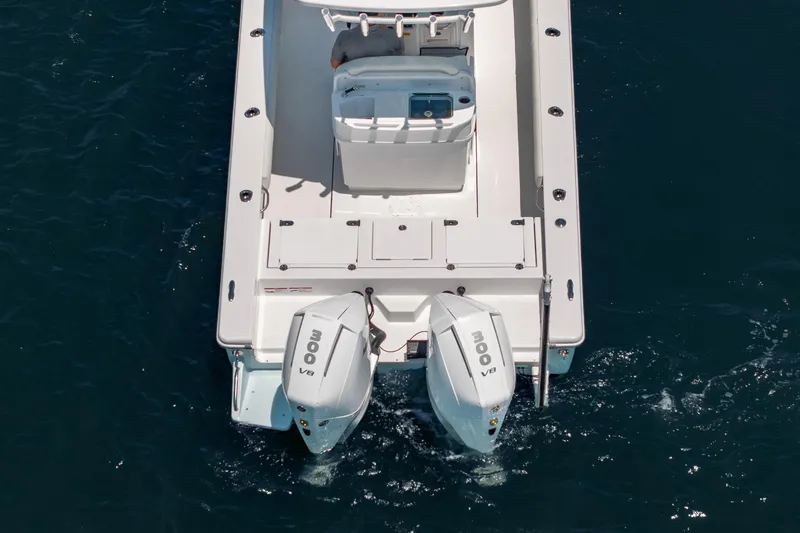 Slide: The Image of Overhead view of 2026 Everglades 273 Center Console boat with dual outboard engines. - 6