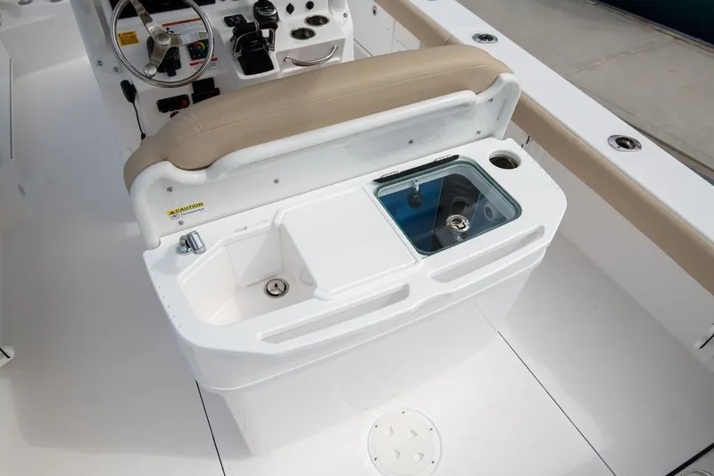 Slide: The Image of Everglades 273 Center Console 2026 boat interior with helm and sink station. - 5