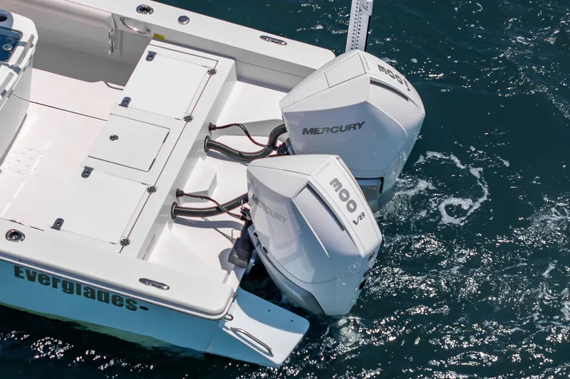 Slide: The Image of 2026 Everglades 273 Center Console boat with twin Mercury outboard engines on water. - 7