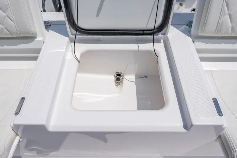 Slide: The Image of Open storage compartment on 2026 Everglades 273 Center Console boat. - 20