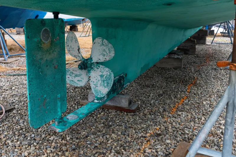 Slide: The Image of Underwater view of a 2002 Nordic Tug 32 propeller and rudder on gravel. - 14