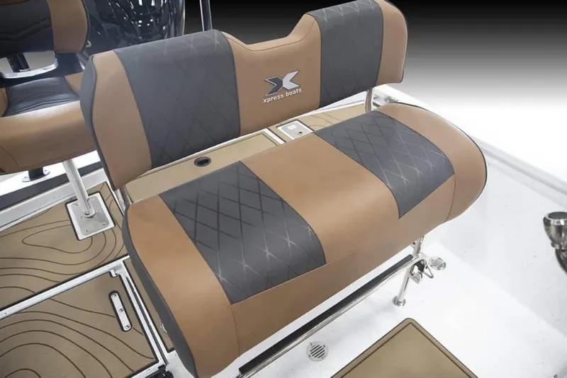 Slide: The Image of Manufacturer Provided Image: 2026 Xpress XR21B Bay boat seat with brown and black quilted upholstery. - 19