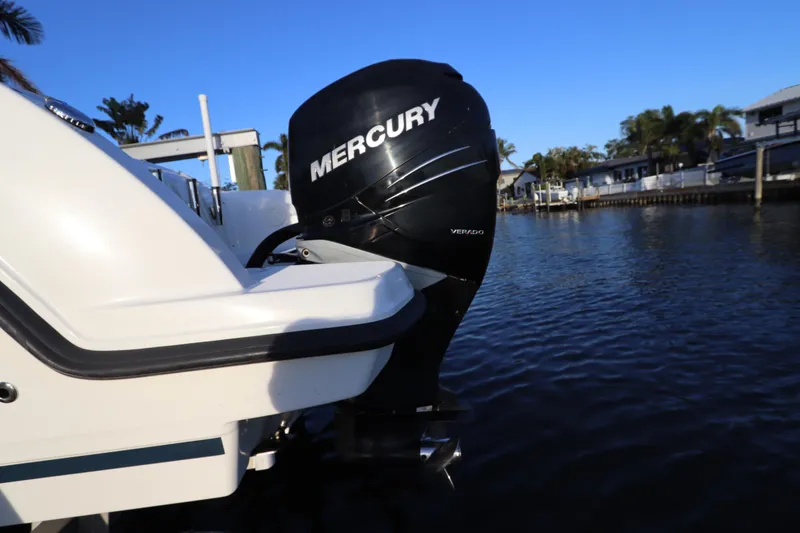 Slide: The Image of 2016 Boston Whaler 270 Vantage with Mercury Verado engine on calm water. - 5