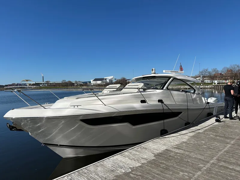 The Image of 2024 Pursuit OS405 yacht docked on a sunny day. - 0