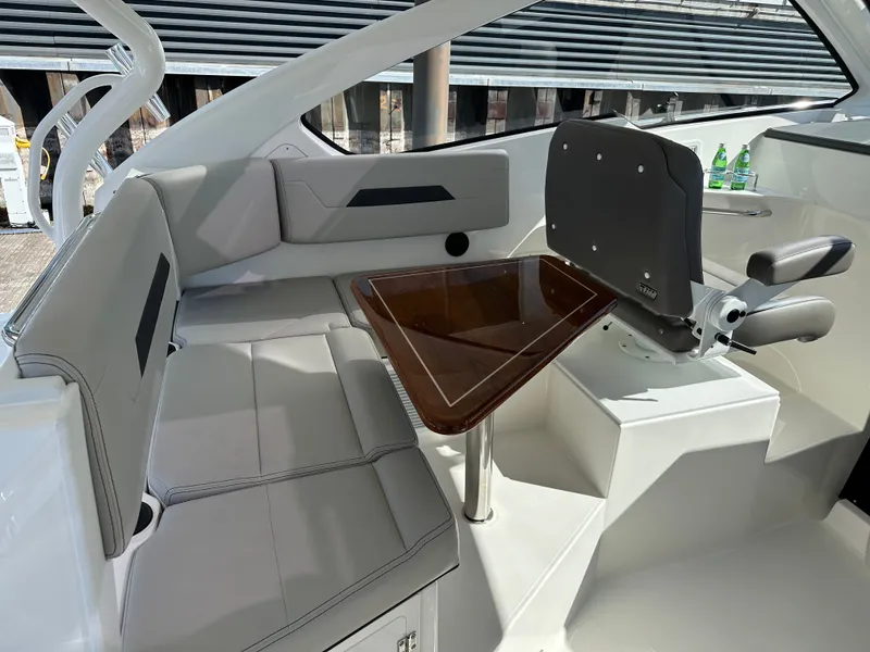 Slide: The Image of Interior of 2024 Pursuit OS405 with seating area and table. - 10