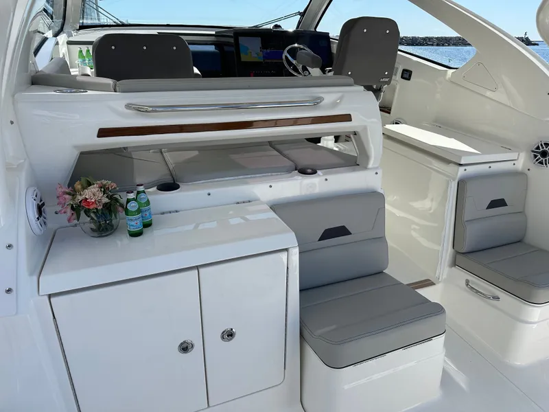 Slide: The Image of Interior of 2024 Pursuit OS405 yacht with elegant furnishings. - 12