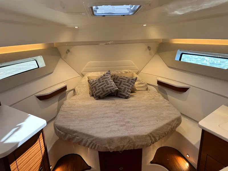 Slide: The Image of Luxurious cabin of the 2024 Pursuit OS405 yacht. - 14