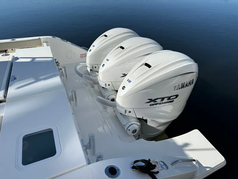 Slide: The Image of 2024 Pursuit OS405 with Yamaha XTO Offshore engines. - 4