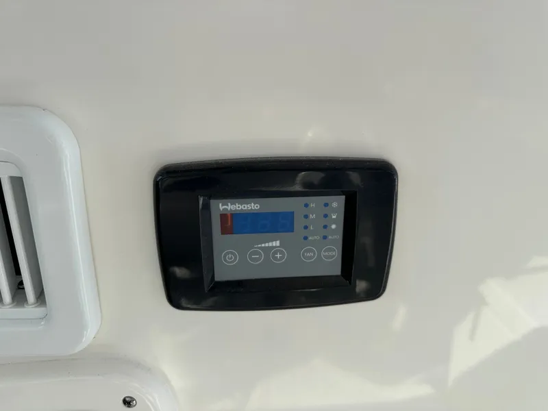 Slide: The Image of Webasto control panel in 2024 Pursuit OS405 boat. - 8