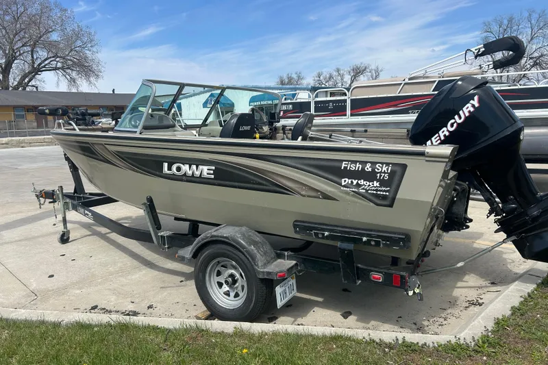 Slide: The Image of 2006 Lowe Fish & Ski 175 boat on trailer with Mercury outboard motor. - 6
