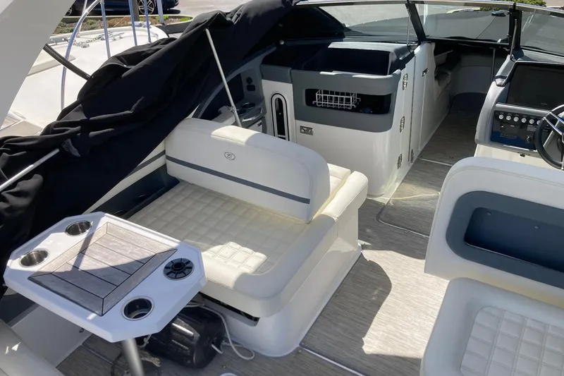 Slide: The Image of Luxurious interior of 2022 Cobalt R30 boat with seating and table. - 11