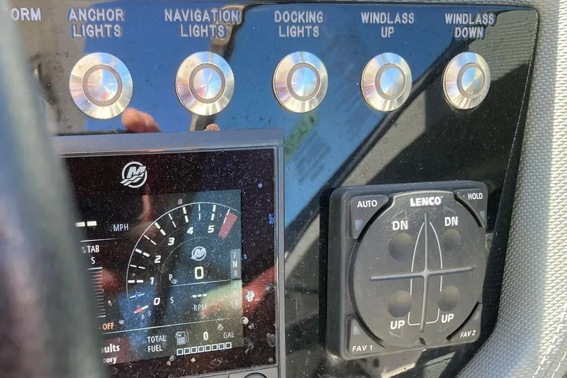 Slide: The Image of Control panel of a 2022 Cobalt R30 boat with navigation and windlass controls. - 28