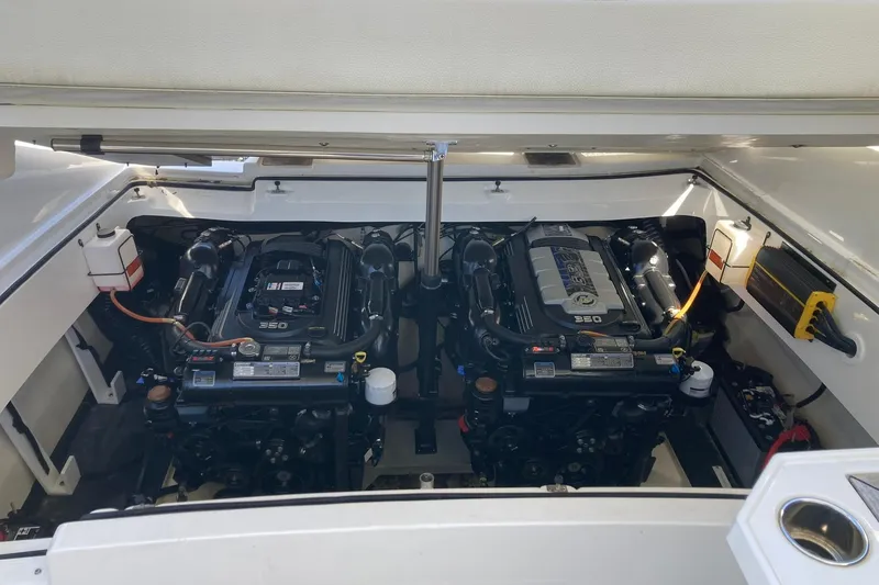 Slide: The Image of 2022 Cobalt R30 boat engine compartment with dual 350 horsepower engines. - 30