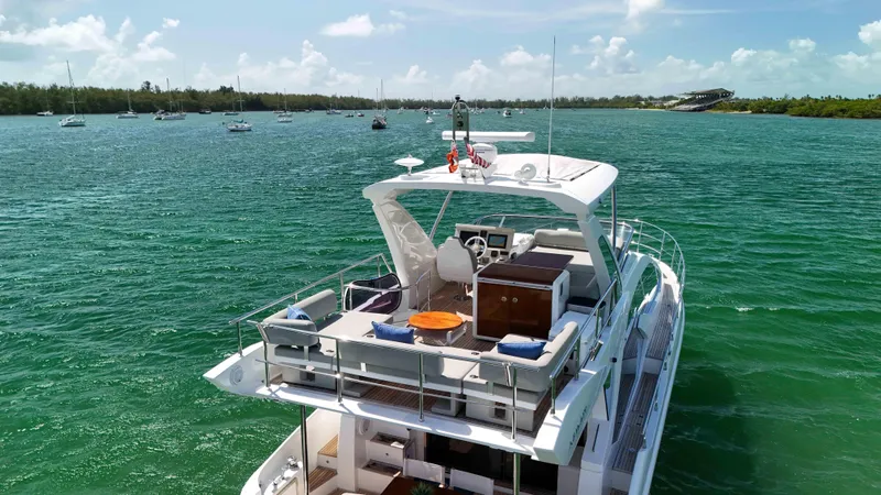 Slide: The Image of Luxurious 2016 Azimut 50 Flybridge yacht cruising on serene waters. - 20