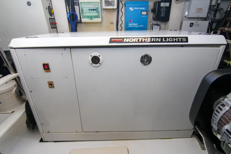 Slide: The Image of Engine room of 2016 Azimut 50 Flybridge with Northern Lights generator. - 49