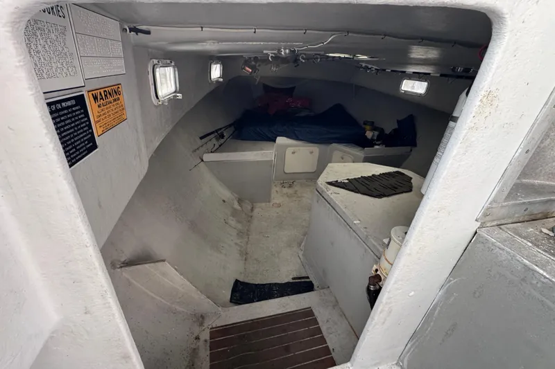 Slide: The Image of Interior cabin of a 2007 Northern Bay 36 boat, featuring a simple, functional layout. - 29