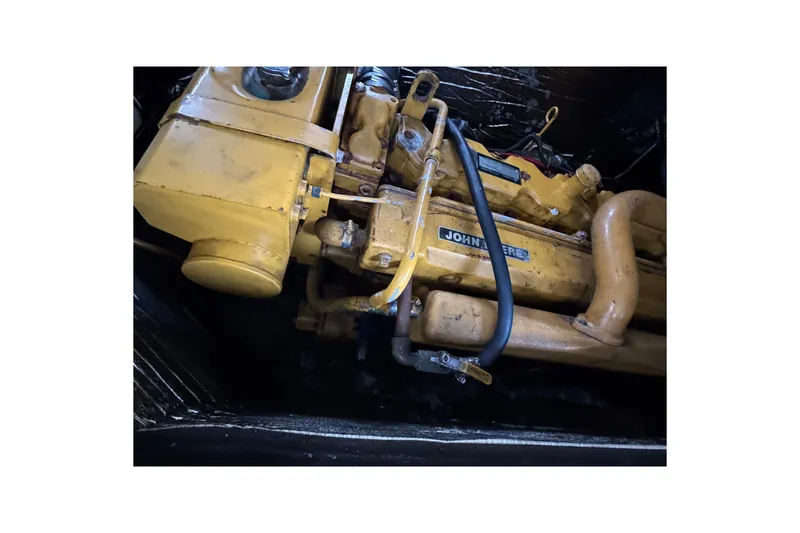 Slide: The Image of Engine of a 2007 Northern Bay 36 boat, featuring John Deere components. - 36