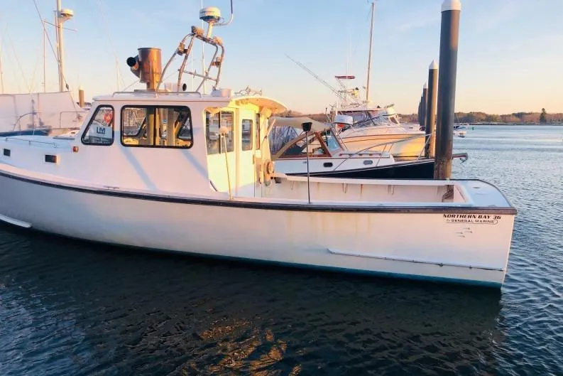 Slide: The Image of Underwater view of a 2007 Northern Bay 36 boat hull with propeller and rudder. - 5