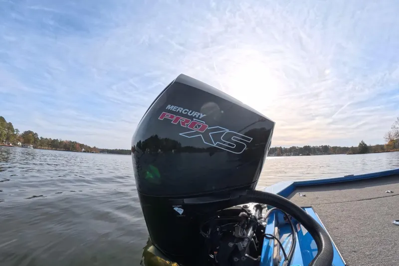 Slide: The Image of 2022 Vexus AVX 2080 boat with Mercury Pro XS engine on a serene lake. - 15