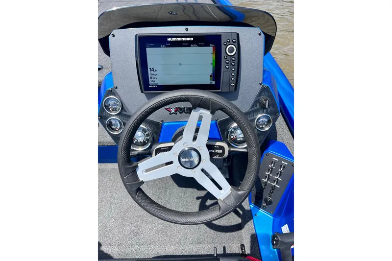 Slide: The Image of 2022 Vexus AVX 2080 boat dashboard with steering wheel and Humminbird display. - 6