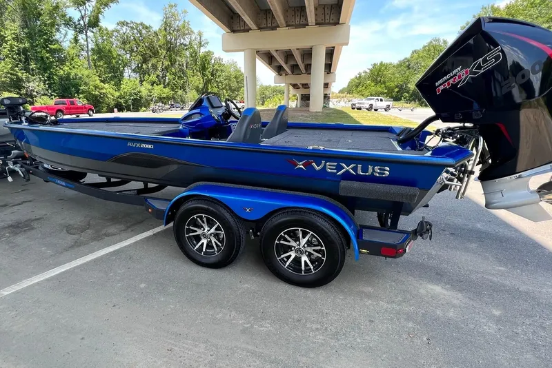 Slide: The Image of 2022 Vexus AVX 2080 boat parked under bridge. - 9