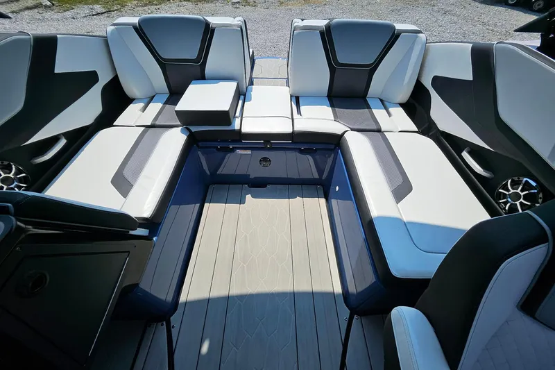 Slide: The Image of 2023 Yamaha Boats 255XD interior with sleek seating and modern design. - 13