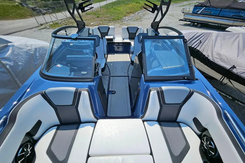 Slide: The Image of 2023 Yamaha Boats 255XD interior with sleek seating and modern design. - 23