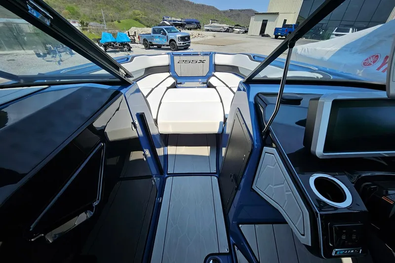 Slide: The Image of 2023 Yamaha Boats 255XD interior with sleek design and modern dashboard features. - 7
