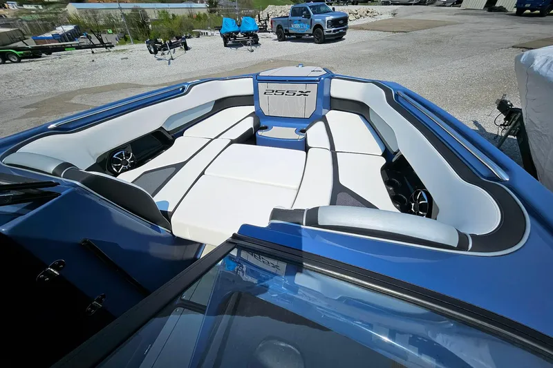 Slide: The Image of 2023 Yamaha Boats 255XD interior with spacious seating and modern design. - 8