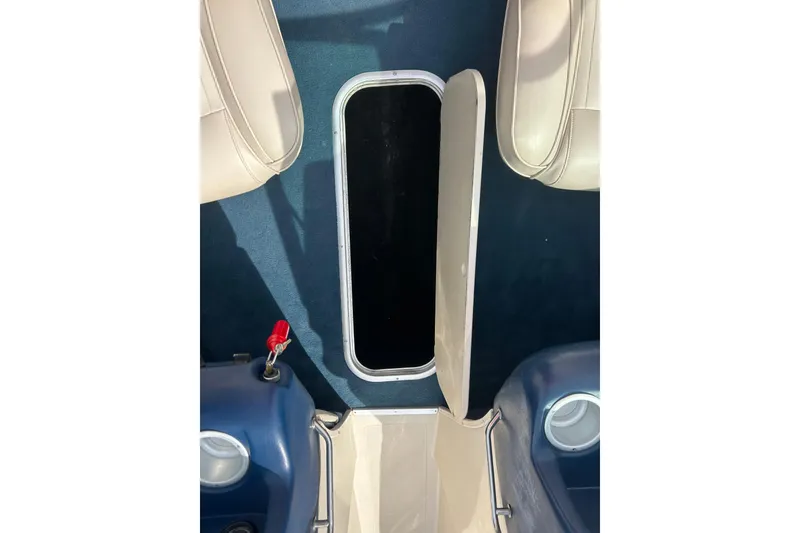 Slide: The Image of Open storage compartment on 1996 Mariah 180 Shabah boat interior. - 16